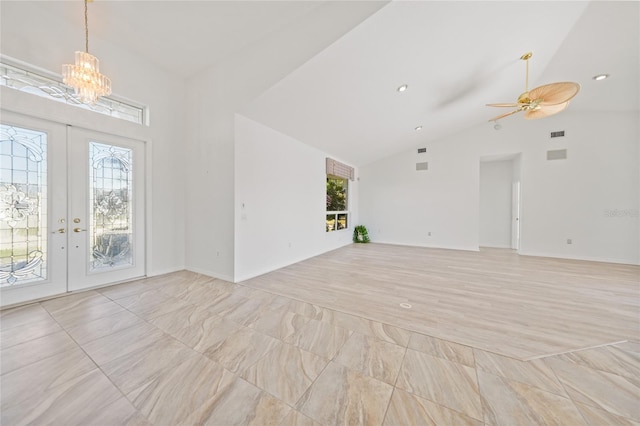 unfurnished living room featuring french doors, light hardwood / wood-style flooring, plenty of natural light, and ceiling fan