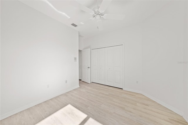 spare room with ceiling fan and light hardwood / wood-style flooring