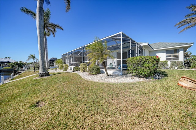 view of yard featuring a lanai