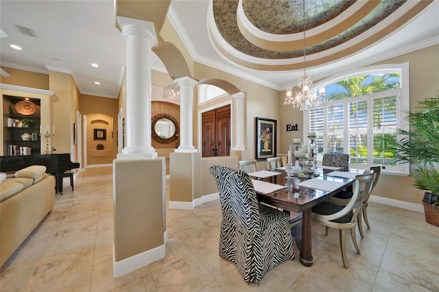 dining space with a chandelier, ornate columns, and crown molding