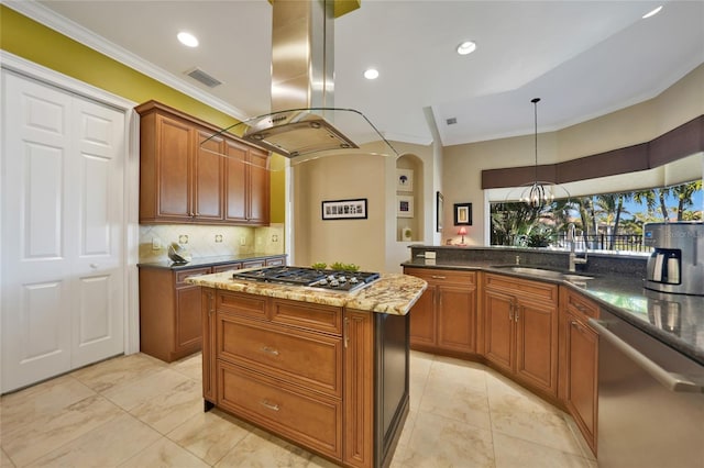 kitchen with island exhaust hood, crown molding, sink, and appliances with stainless steel finishes