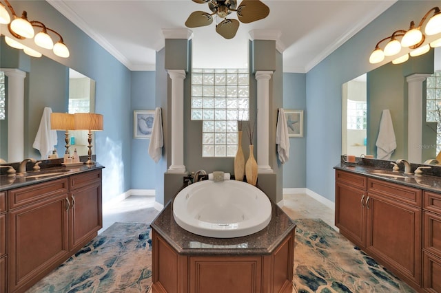 bathroom featuring a bath, ornate columns, a wealth of natural light, and crown molding