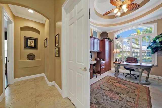 office with a raised ceiling, crown molding, and ceiling fan