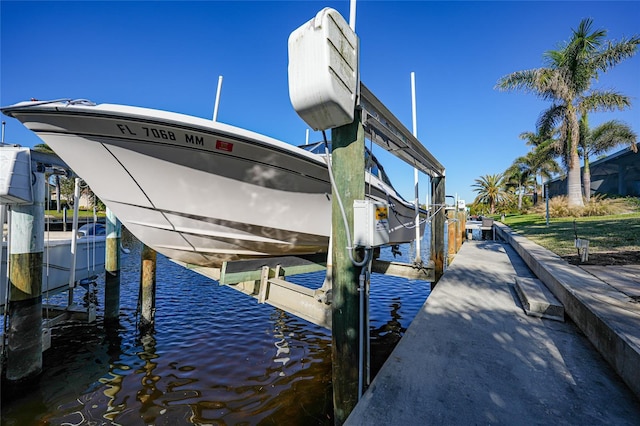 view of dock with a water view