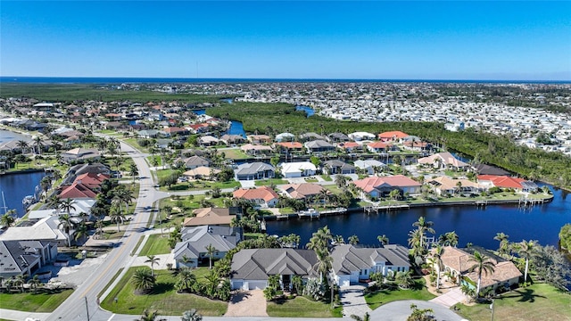 drone / aerial view with a water view