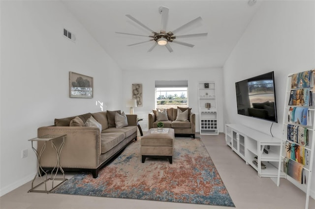 living room with ceiling fan and vaulted ceiling