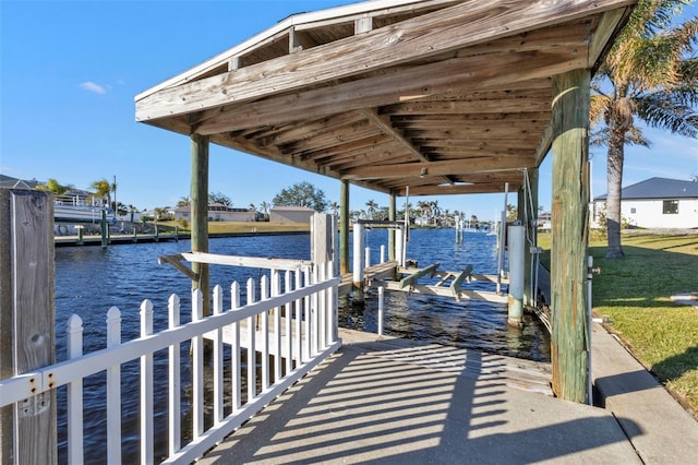 dock area featuring a water view