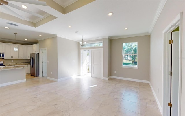 unfurnished living room featuring crown molding and an inviting chandelier