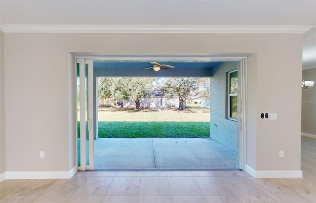 doorway with ornamental molding and a healthy amount of sunlight