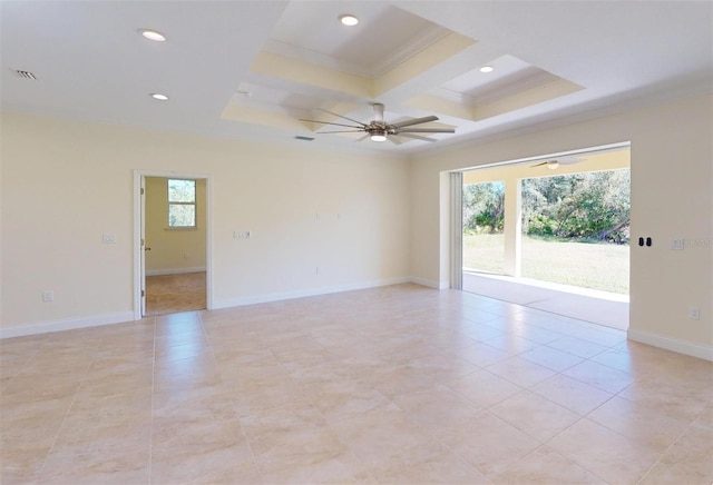 empty room featuring ceiling fan, plenty of natural light, coffered ceiling, and ornamental molding