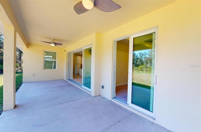 view of patio with ceiling fan