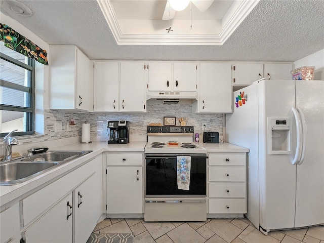 kitchen featuring white cabinets, a textured ceiling, white appliances, and sink