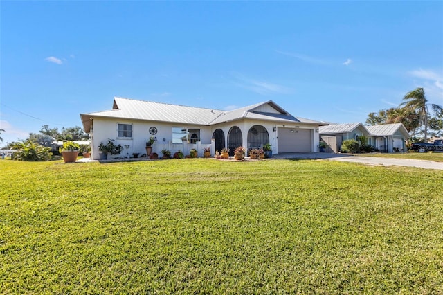 ranch-style house with a front yard and a garage