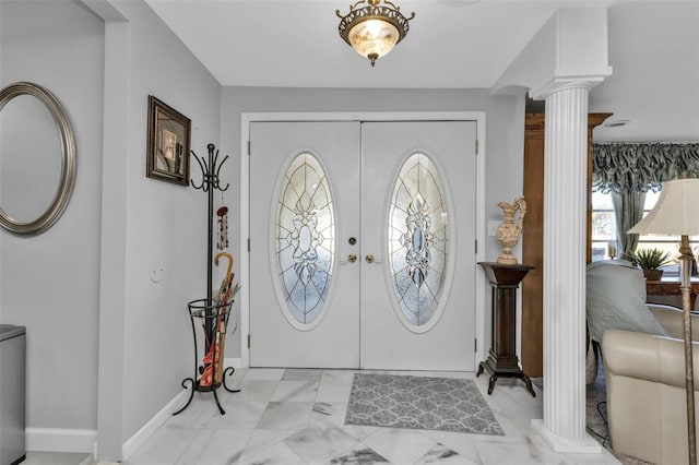 foyer with french doors and ornate columns