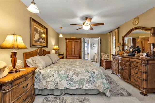 bedroom with ceiling fan and light tile patterned flooring