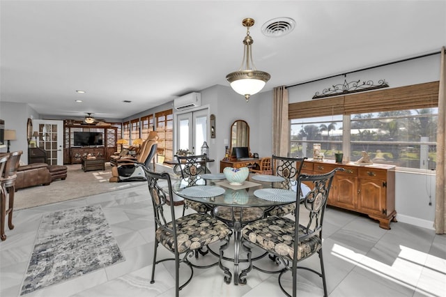 dining space with a wall mounted AC, ceiling fan, and light tile patterned floors