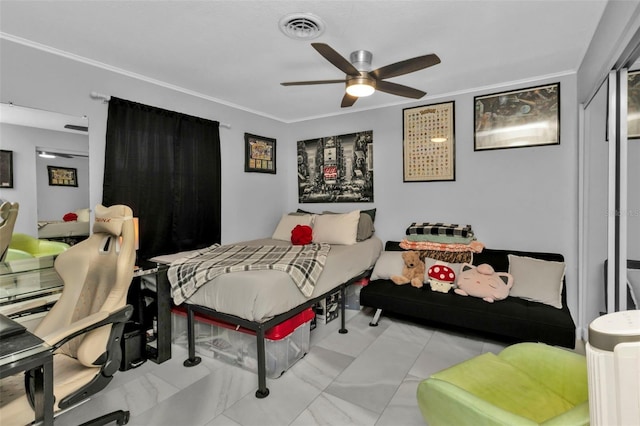 bedroom featuring ceiling fan and ornamental molding