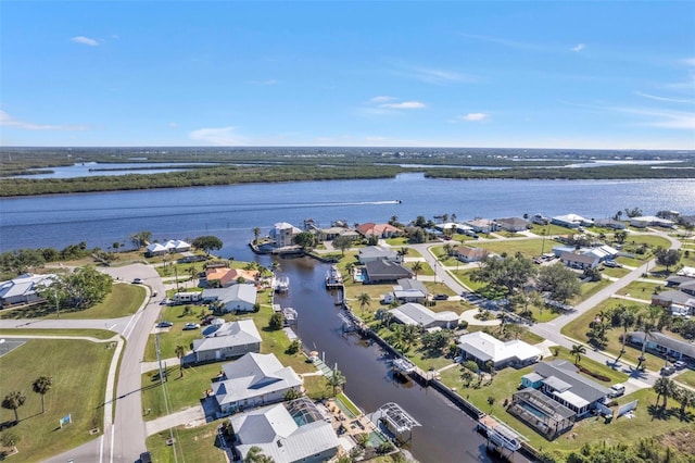 drone / aerial view with a water view