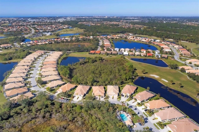 bird's eye view with a water view