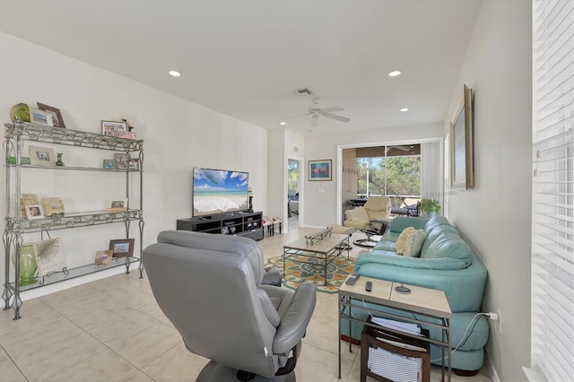 tiled living room featuring ceiling fan