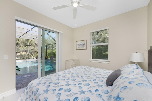 bedroom featuring access to outside, multiple windows, and ceiling fan