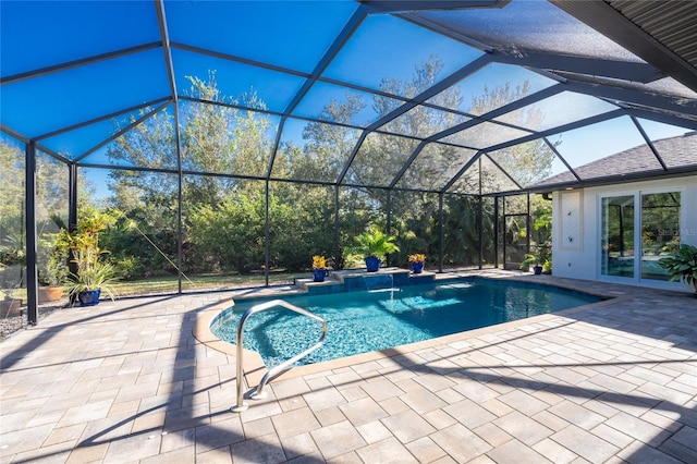 view of pool featuring a patio and a lanai