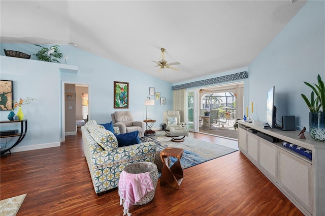 living room with ceiling fan, vaulted ceiling, and dark hardwood / wood-style floors