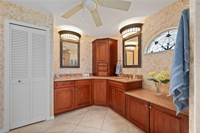 bathroom with ceiling fan, tile patterned flooring, and vanity