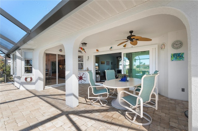 view of patio featuring ceiling fan