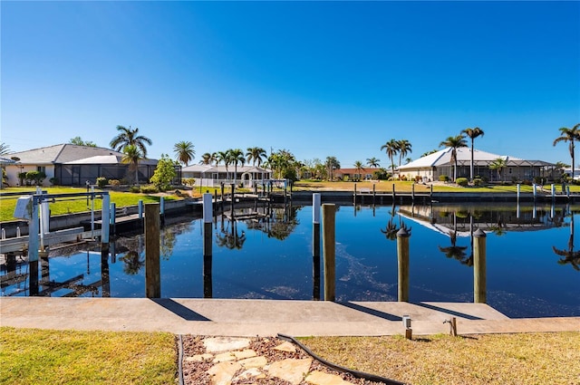 dock area with a water view