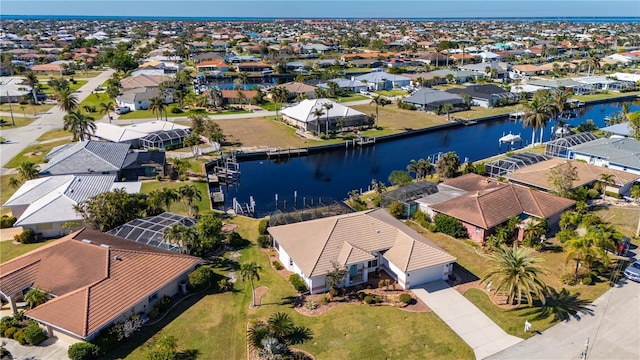 drone / aerial view featuring a water view