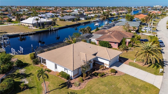 drone / aerial view with a water view