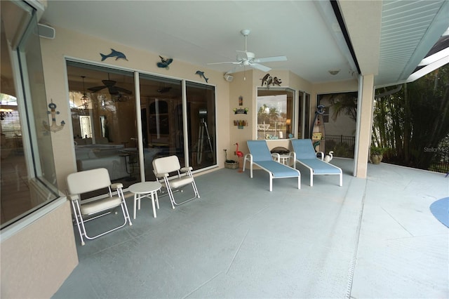 view of patio / terrace featuring ceiling fan