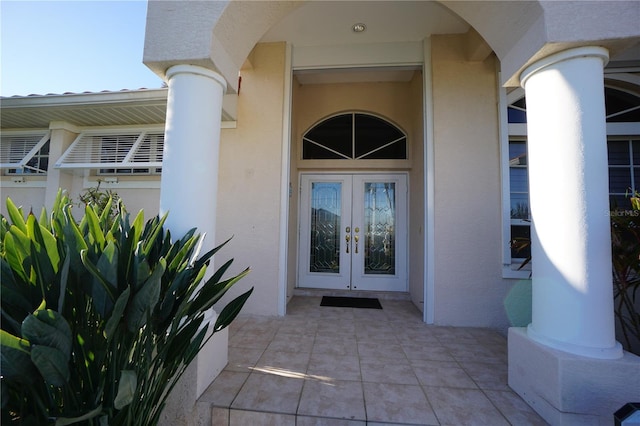 doorway to property featuring french doors