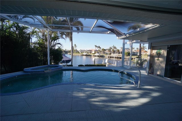 view of swimming pool with a water slide, a water view, a lanai, an in ground hot tub, and a patio