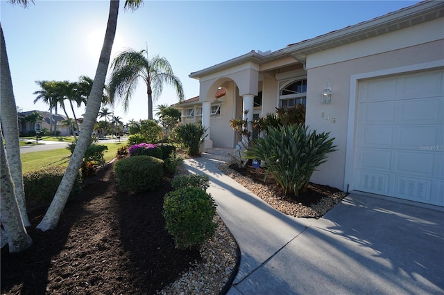 view of front of home with a garage