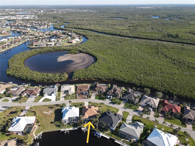 drone / aerial view with a water view