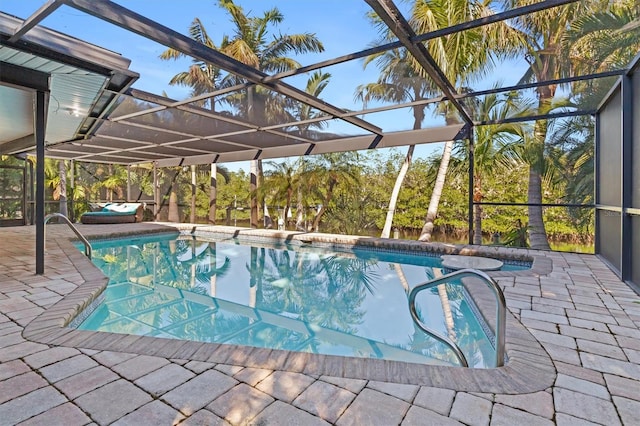 view of pool featuring a lanai and a patio area