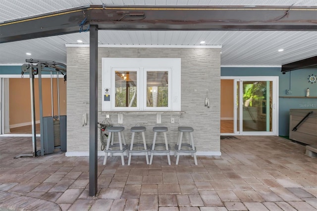 view of patio featuring an outdoor bar