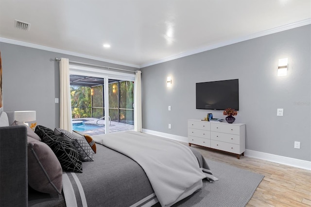 bedroom featuring access to exterior, light hardwood / wood-style flooring, and crown molding