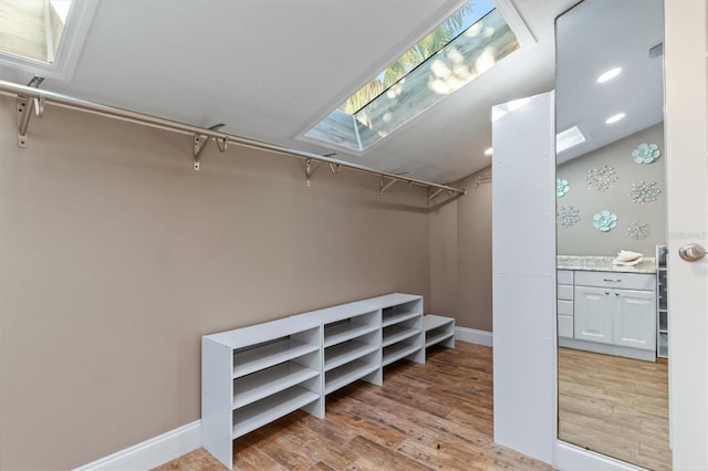 spacious closet with light wood-type flooring