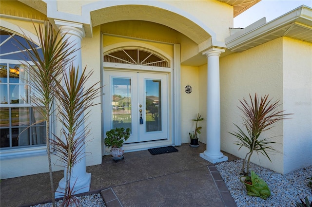 property entrance featuring french doors