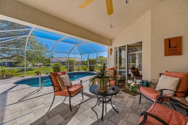 view of patio with ceiling fan and a lanai