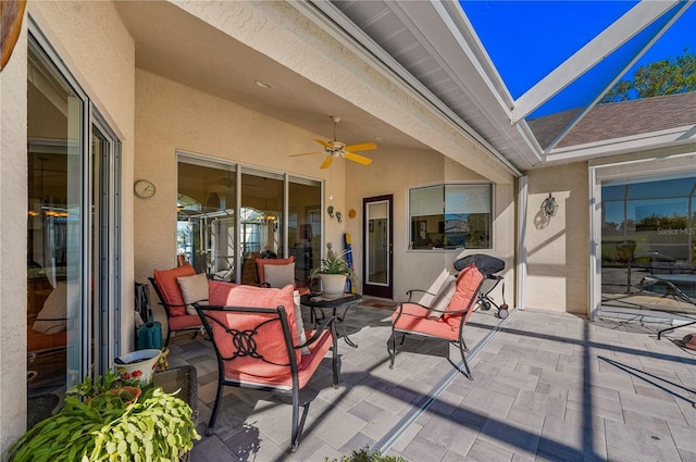 view of patio with ceiling fan