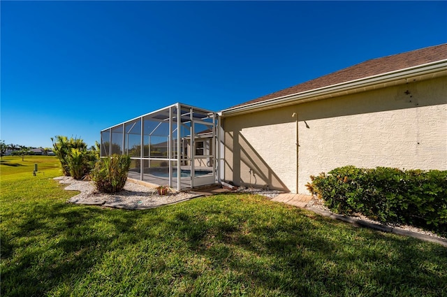 exterior space featuring glass enclosure