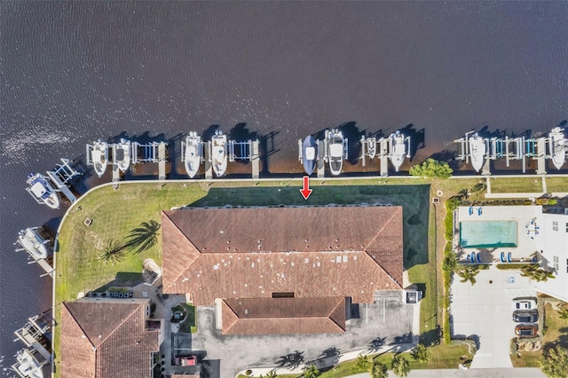 birds eye view of property featuring a water view