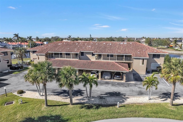 view of building exterior with a carport