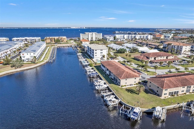 drone / aerial view with a water view