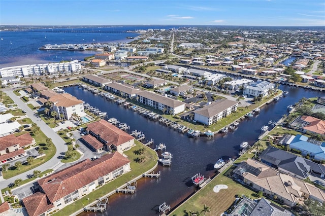 drone / aerial view featuring a water view