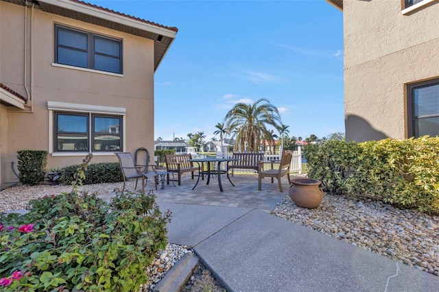 view of patio featuring outdoor dining area